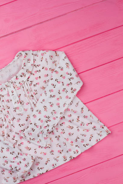 istock Girls' top with ruffle collar 891664912