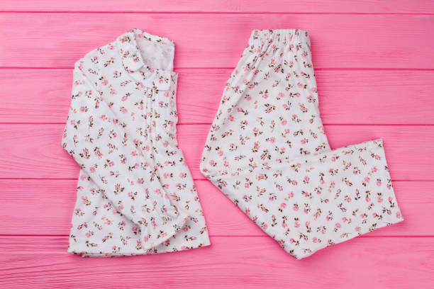 istock Girls' pajama set on pink 891668252