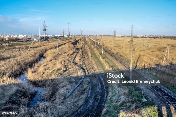 Plot Railway Top View On The Rails Highvoltage Power Lines For Electric Trains Stock Photo - Download Image Now