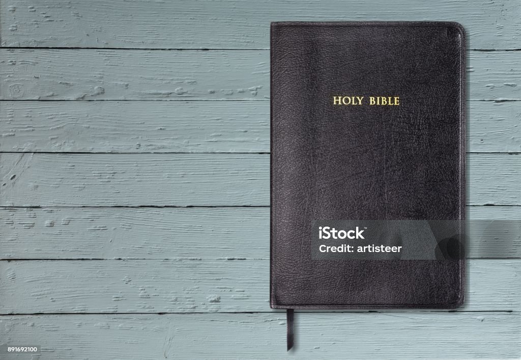 Bible. Holy Bible book on wooden background Bible Stock Photo
