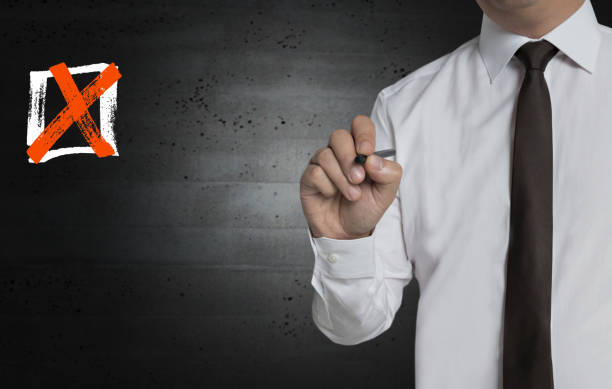 istock Checkbox is written by businessman on screen 891694704