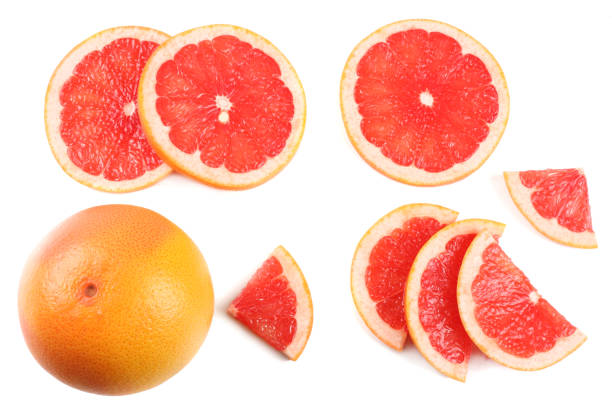 istock healthy food. sliced grapefruit isolated on white background top view 891699290