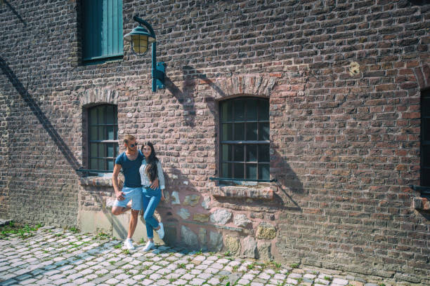 istock Beautiful couple at stoned building 891706794
