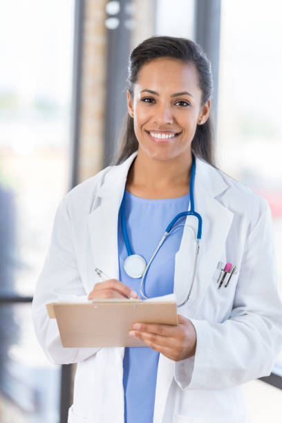 istock Portrait of confident female doctor 891724182