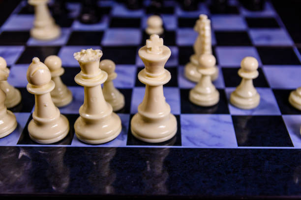 istock Composition of the chess pieces on a chess board 891729566