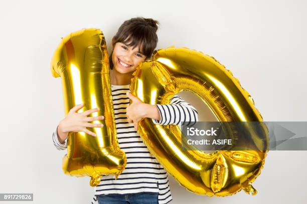 Ten Birthday Party Girl With Golden Balloons Stock Photo - Download Image Now - 10-11 Years, Anniversary, Number 10