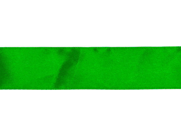 istock Green satin ribbon isolated on white background with clipping path 891732994