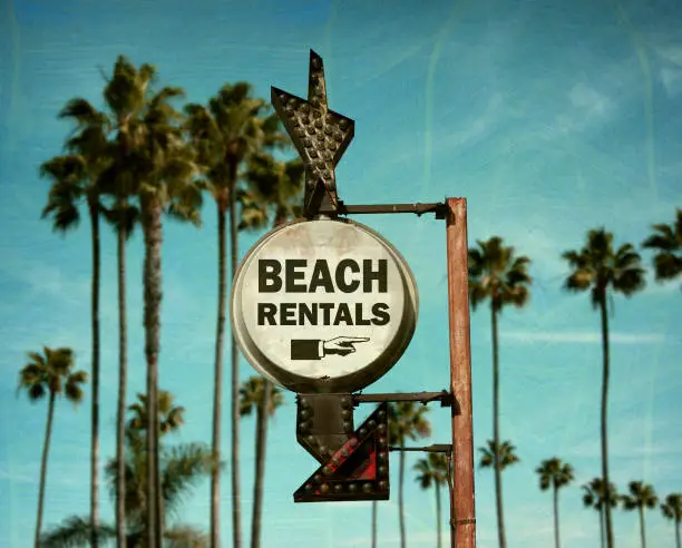 Photo of beach rentals sign