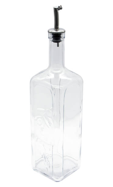 istock Glass olive oil bottle on the white background 891737274