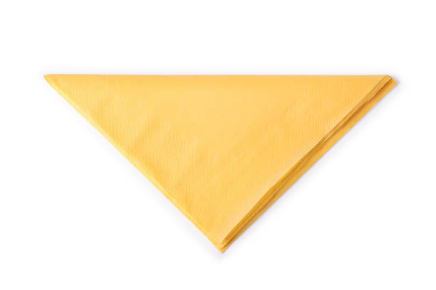 istock Yellow folded paper napkin isolated with clipping path 891758436