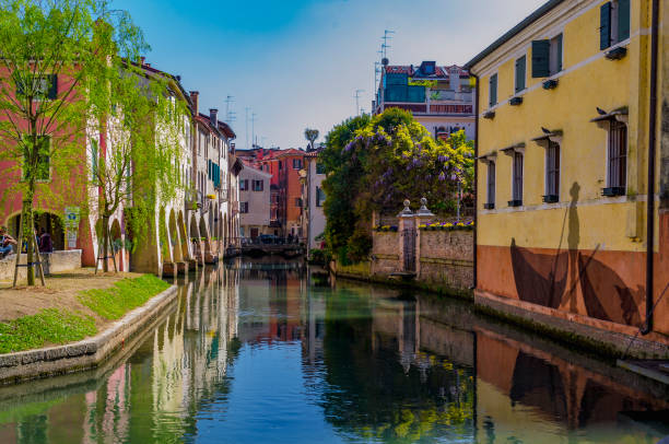 A glimpse of the Buranelli canal in Treviso (Veneto, Italy). stock photo