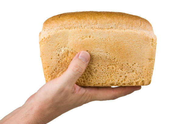 istock loaf of bread in his hand 891780170