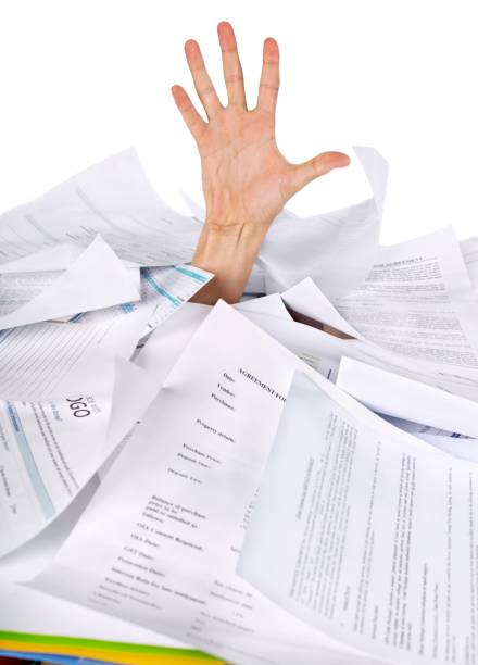 Paperwork. Buried Under Paperwork buried stock pictures, royalty-free photos & images