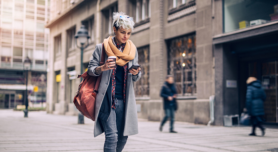 27 years old woman is in the city. She is going to meet with close friends