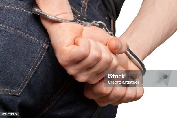 Handcuffs Stock Photo - Download Image Now - Arrest, Conflict, Crime