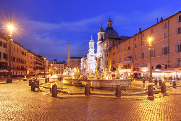 istock Piazza Navona Square at night, Rome, Italy 891798326
