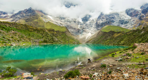 Humantay lake in Peru on Salcantay mountain in the Andes Humantay lake in Peru on Salcantay mountain in the Andes at 5473m altitude Sallqantay stock pictures, royalty-free photos & images