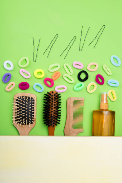istock Female set, for combing hair, on a green background 891807142