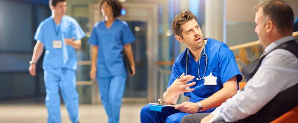 istock doctor running through a prognosis 891807638