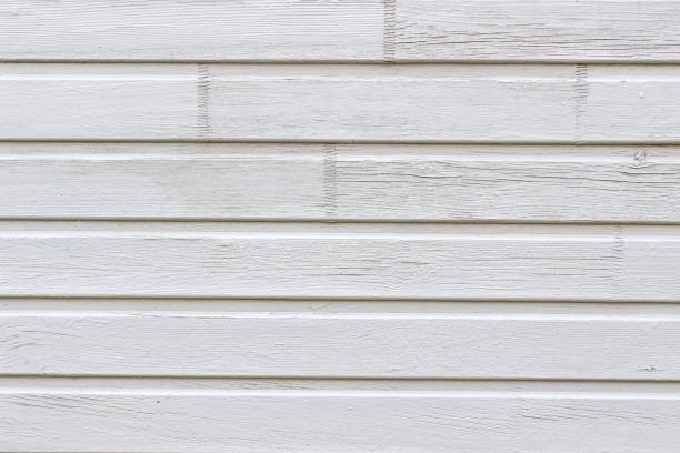 istock Wall made of painted wooden planks. Texture, background. 891823192