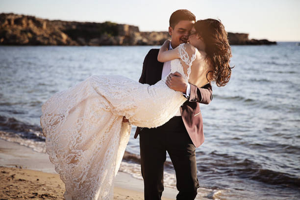 istock Bride and Groom, Enjoying Amazing Sunset 891826668
