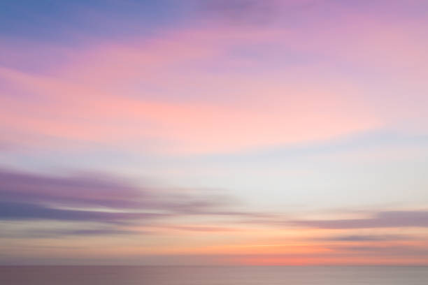 istock Defocused sunset sky and ocean nature background with blurred panning motion. 891826750
