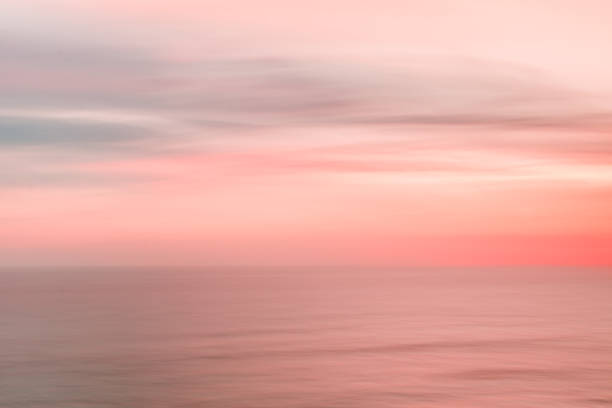 istock Defocused sunset sky and ocean nature background with blurred panning motion. 891826752
