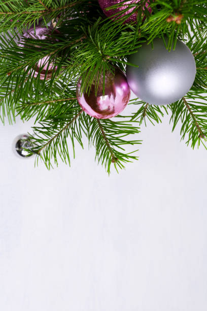 istock Christmas arrangement with pink and silver baubles, copy space 891830096