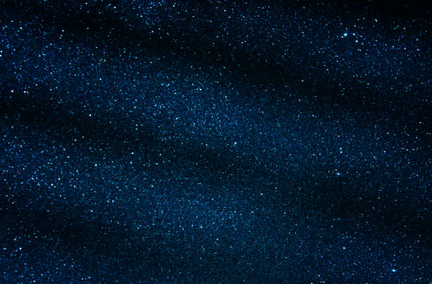 istock blue glitter vintage lights background. defocused. 891832498