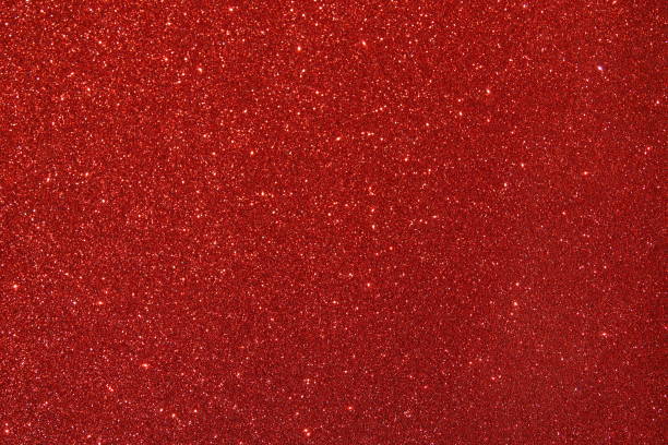 istock black and red glitter lights background. defocused. 891832508