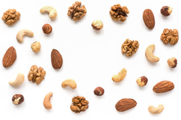 istock Walnut, cashew, almond and hazelnut on white background. Copy space. 891835408