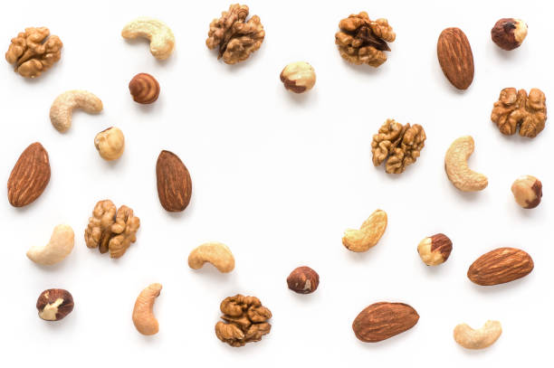 Walnut, cashew, almond and hazelnut on white background. Copy space. stock photo