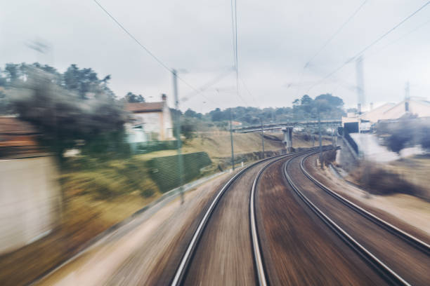 istock View from train cabin of turn right under bridge 891840846