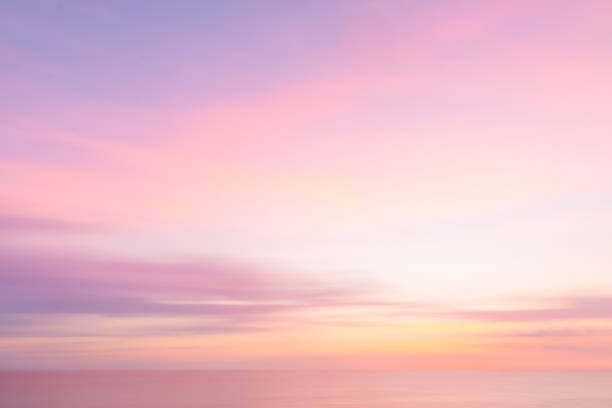 istock Defocused sunset sky and ocean nature background with blurred panning motion. 891841214