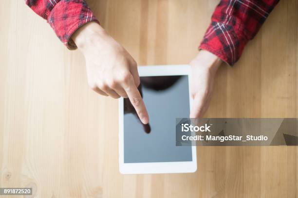 Closeup Of Person Browsing On Touchpad At Table Stock Photo - Download Image Now - Adult, Adults Only, Business