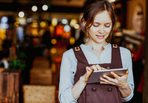 istock Closeup of Content Nice Woman Networking on Tablet 891882640