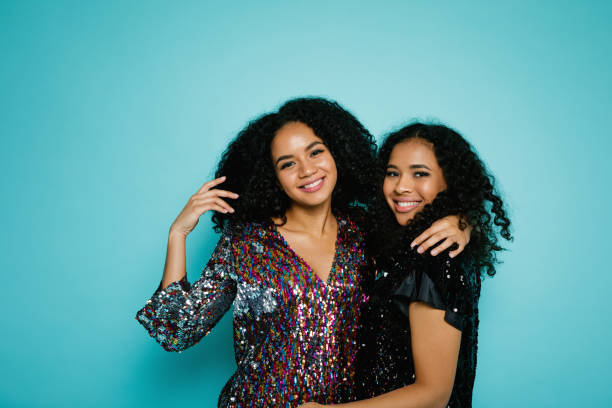 istock Two women happy standing together in studio 891906832