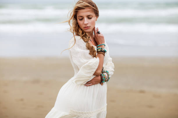istock Dreamy girl on beach 891909018