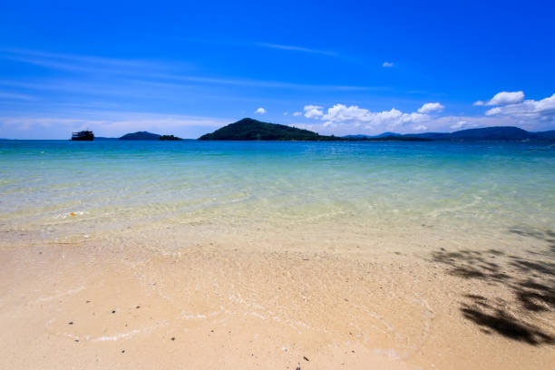 istock Beach with golden sand and sea. 891918134
