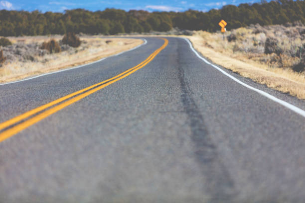 istock High Desert Paved Road With Distant Tight Curve 891918872