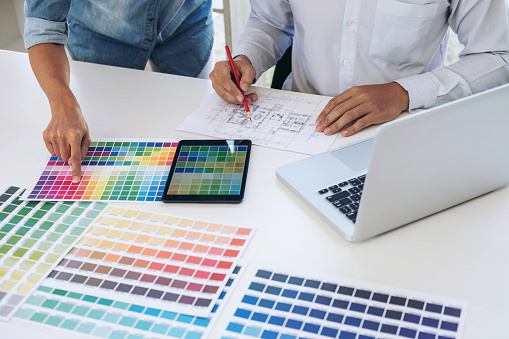 Two Interior Design Or Graphic Designer At Work On Project Of ...