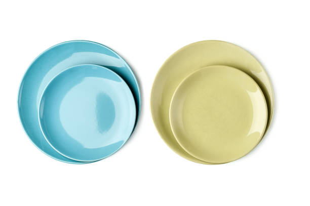 istock Green and blue plates on a white background. Isolated. 891931246