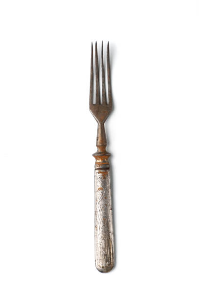 istock Old rusty dessert fork in a classic style. Isolated on white background. 891931260