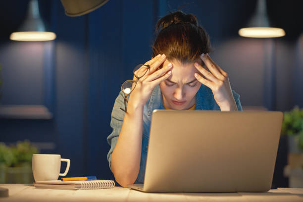 istock woman working on a laptop 891937312