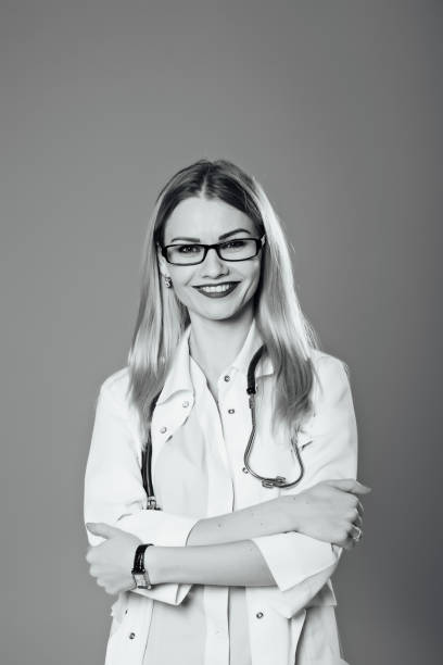 istock smiling girl doctor looking at the camera 891939592