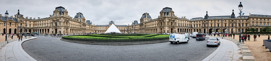 Paris, France - November 23, 2017: Panorama of the Louvre Museum roundabout under a wintry sky