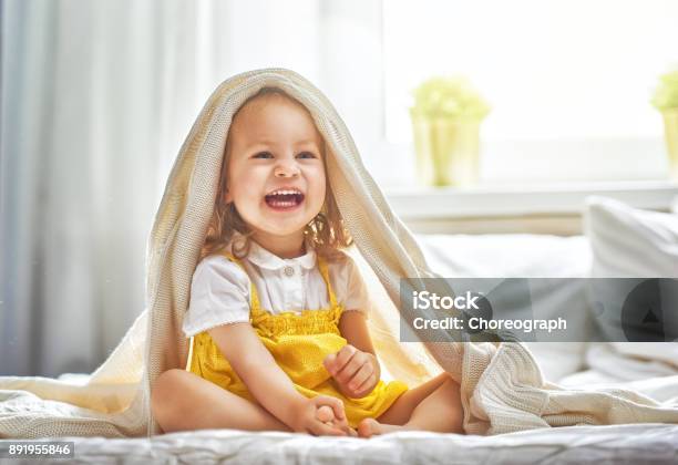 Baby Girl On The Bed Stock Photo - Download Image Now - Baby - Human Age, Happiness, Child
