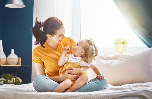 istock Mom and her daughter are playing 891955886