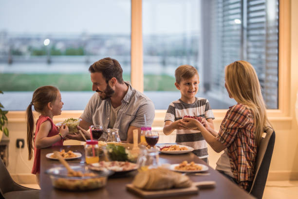 istock Mommy, daddy, we brought salad for you! 891956192