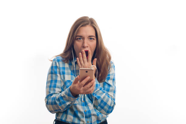 istock Shocked young woman looking at the camera 891956686